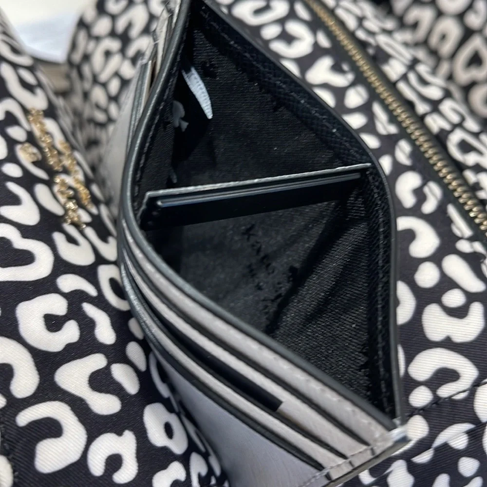 Kate Spade Madison Small Slim Card Holder
Platinum Grey Multi
NWT - Picture 10 of 16